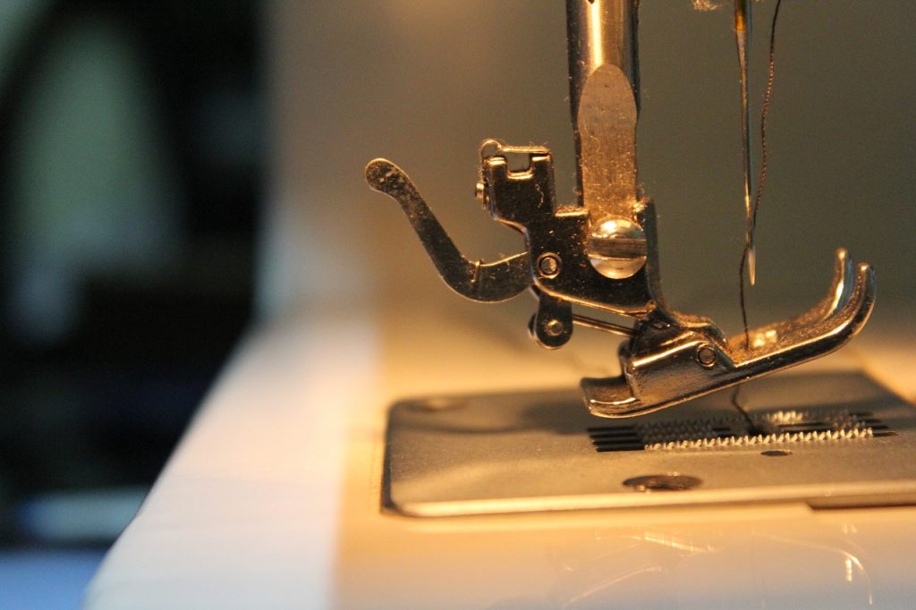 How does a sewing machine work